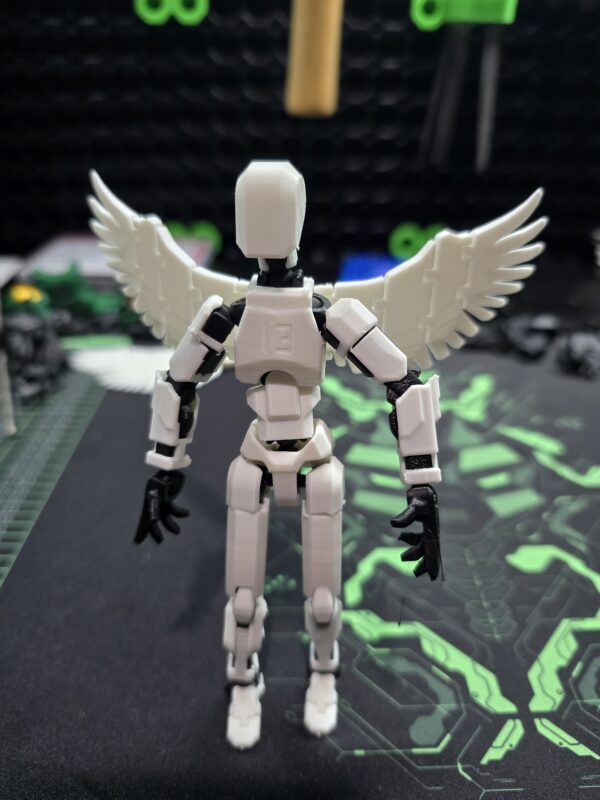 White Dummy 13 figure with black joints and custom white wing accessories, printed by FoxForge